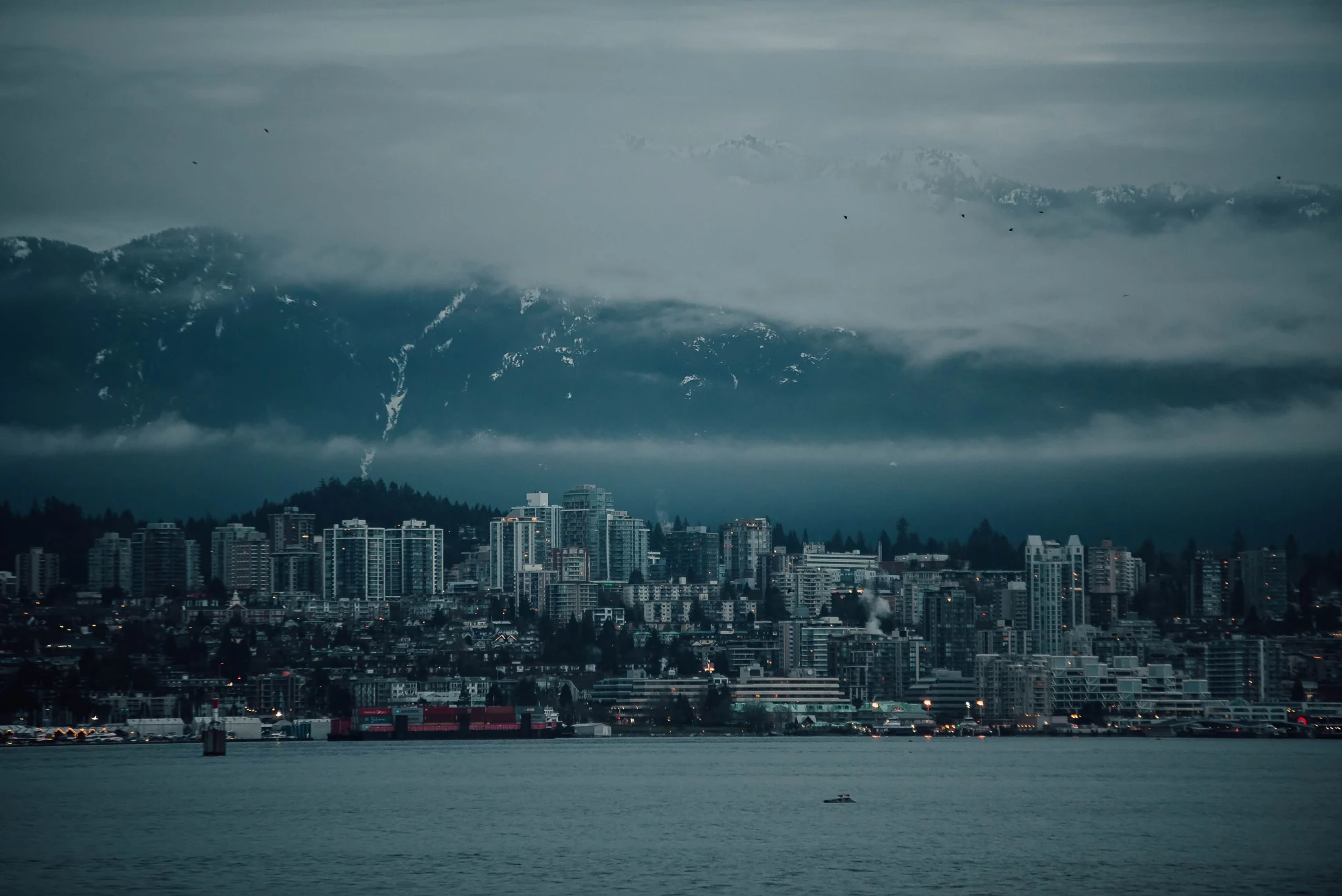 The North Shore waterfront seen across Vancouver’s harbour.